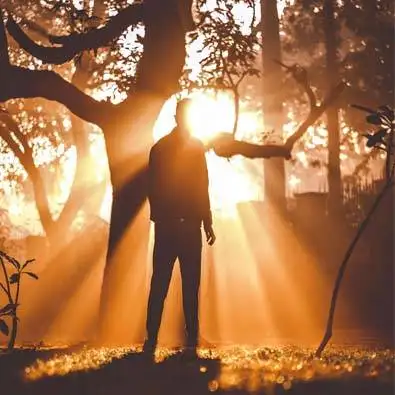 Man standing in sunshine